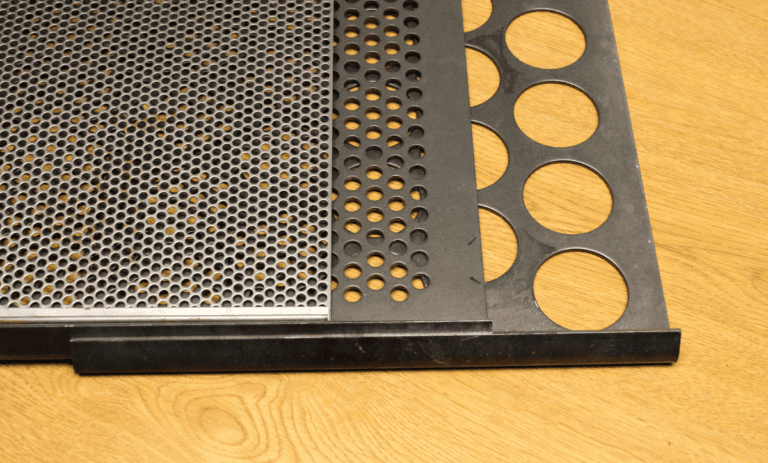 3 perforated metal sheets with different sized round holes