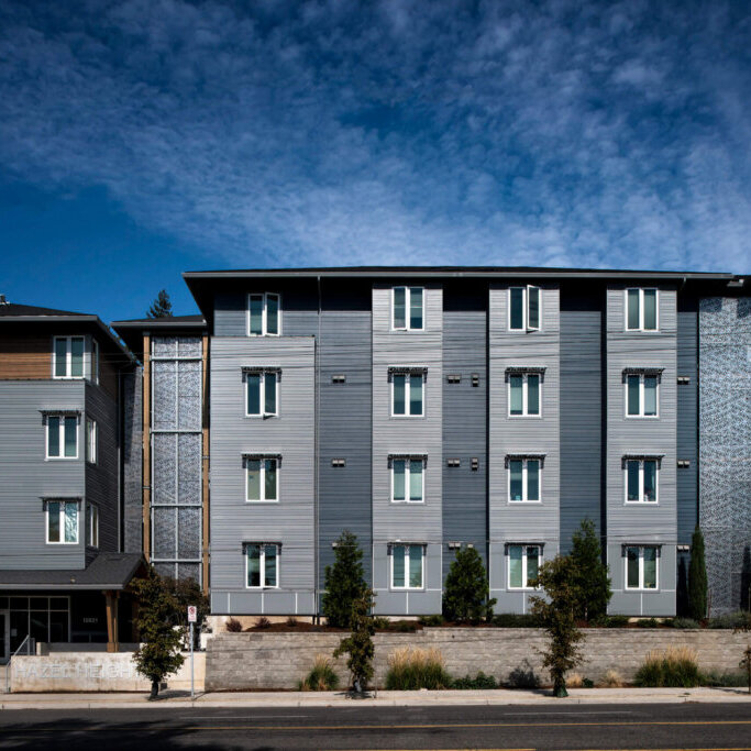 An exterior view of Hazel Heights Apartments located at 12621 SE Stark Street in Portland, Oregon.