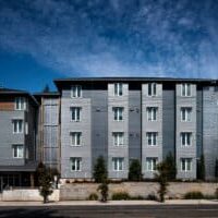 Hazel Heights Apartments-JHW3395 An exterior view of Hazel Heights Apartments located at 12621 SE Stark Street in Portland, Oregon.